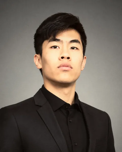 Evan Kwan, studio headshot